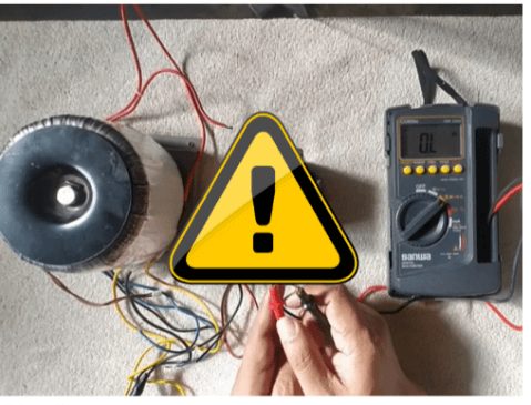 technician putting safety precaution sign to electronic materials on the table