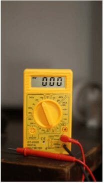 yellow color multimeter at 0 reading
