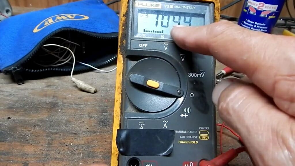multimeter at 104.4 reading