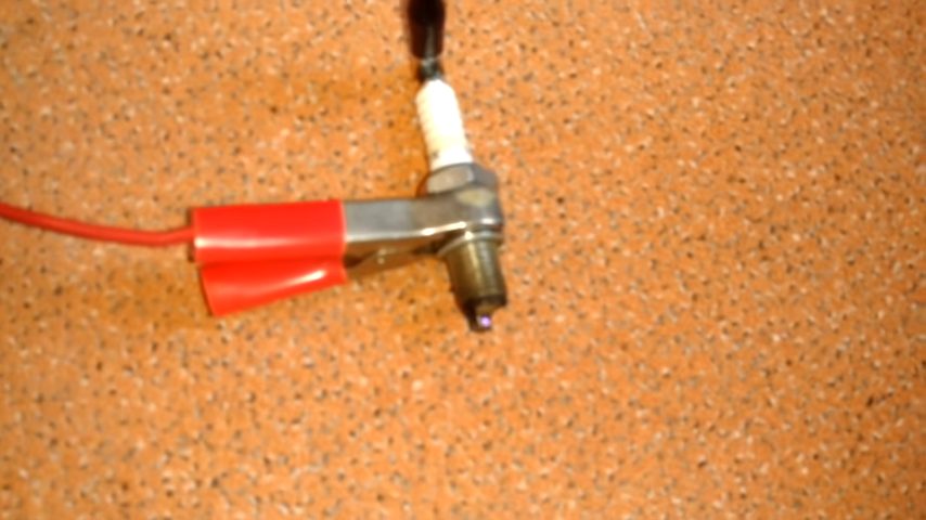 an ignited spark plug