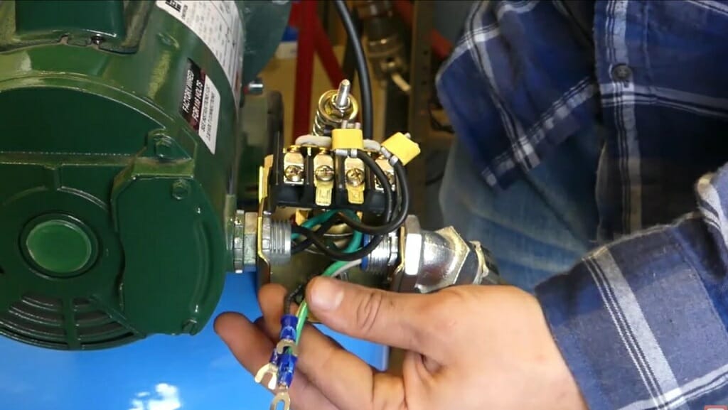 man opening the switch box