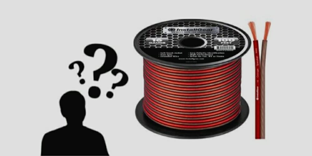 silhouette of man and rolled gaue wires