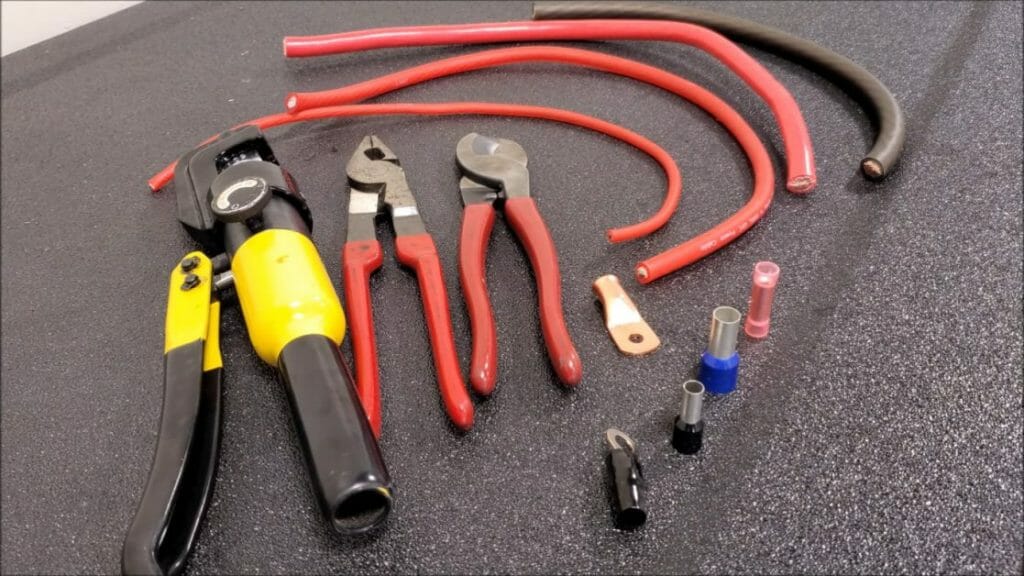 A wiring tool in a black carpeted floor