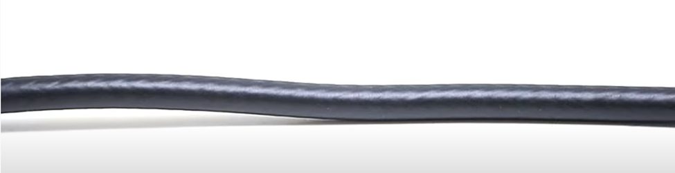 cable against the baseboard