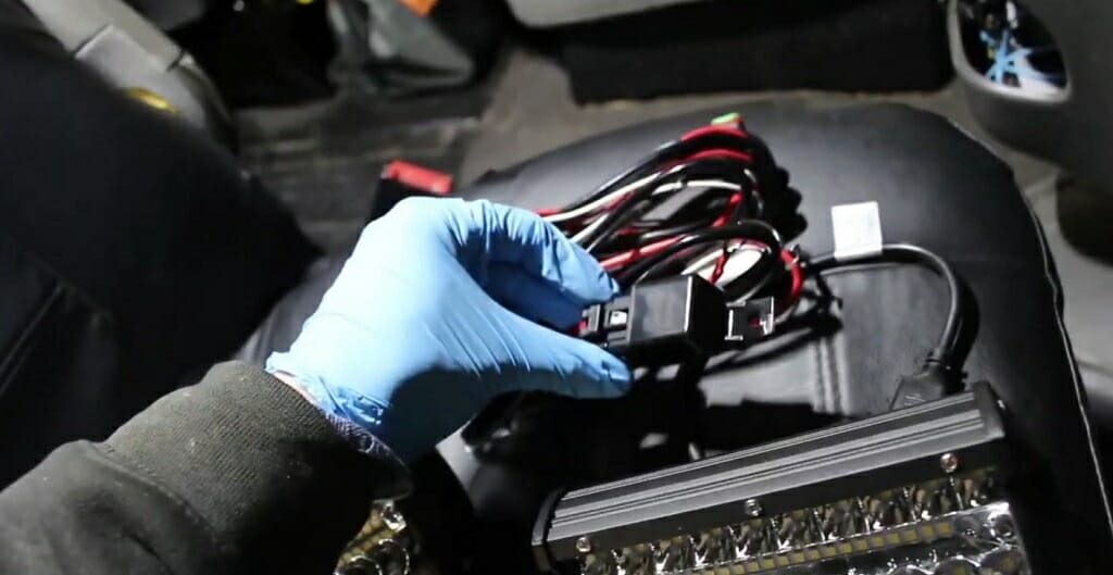 connect the wire harness to the lights