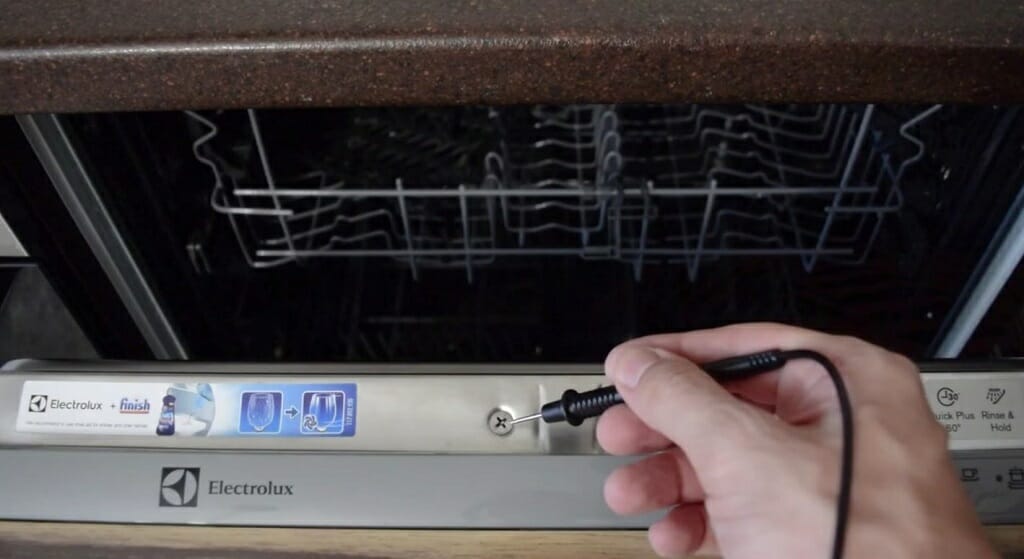 connecting the multimeter's black probe to any ground point