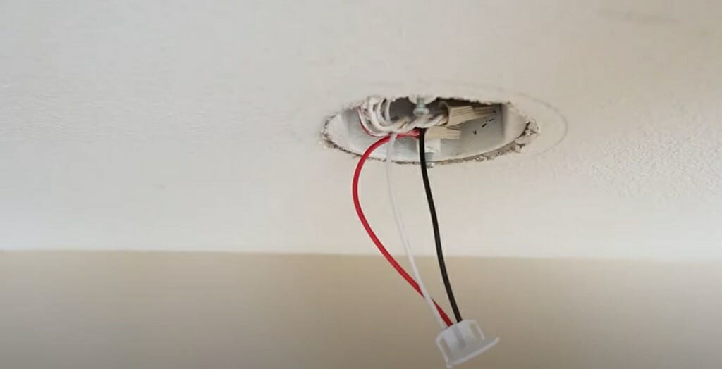 connecting the two red wires from the work box to the wire harnesss red wire