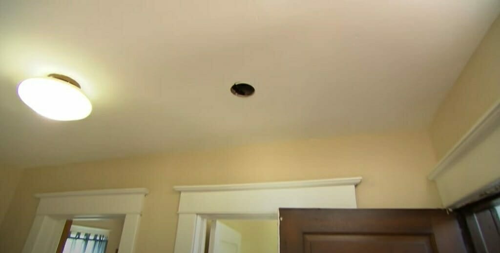 cutting the drywall on the 1st smoke alarm's location