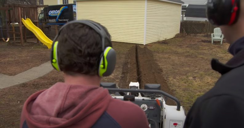 installing service wiring from the main building to the garage