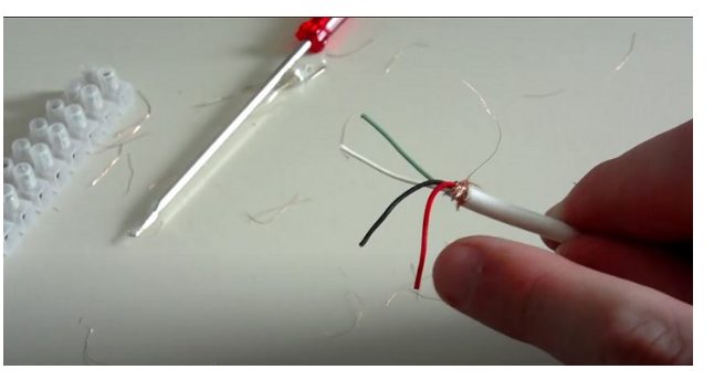 A person is opening the usb cable