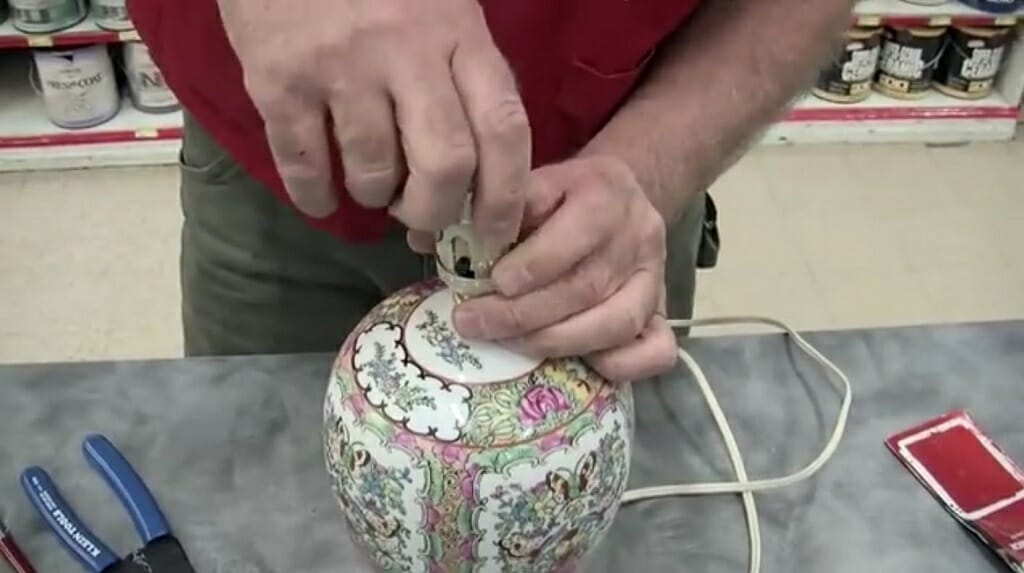 putting together all the parts of the bulb socket