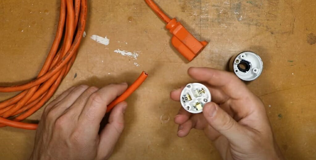 removing housing of the male plug