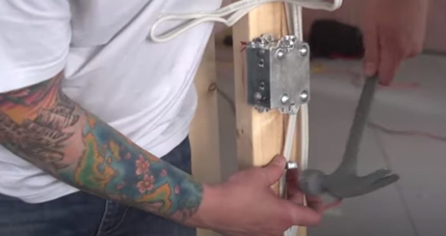 run the wire and secure it with the hammer