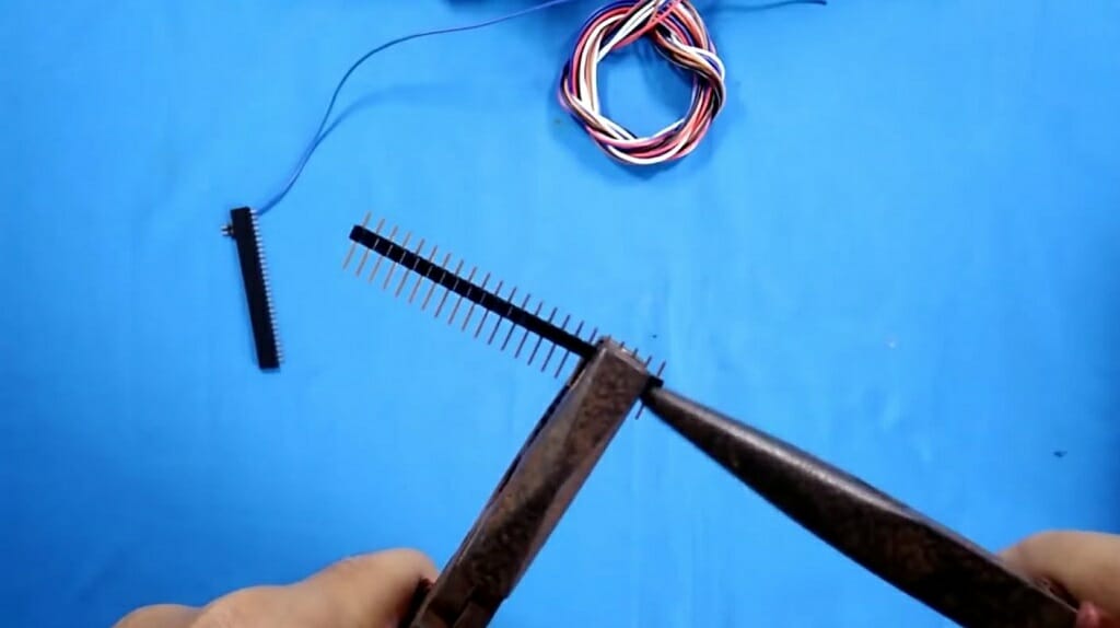 separating two male header pins