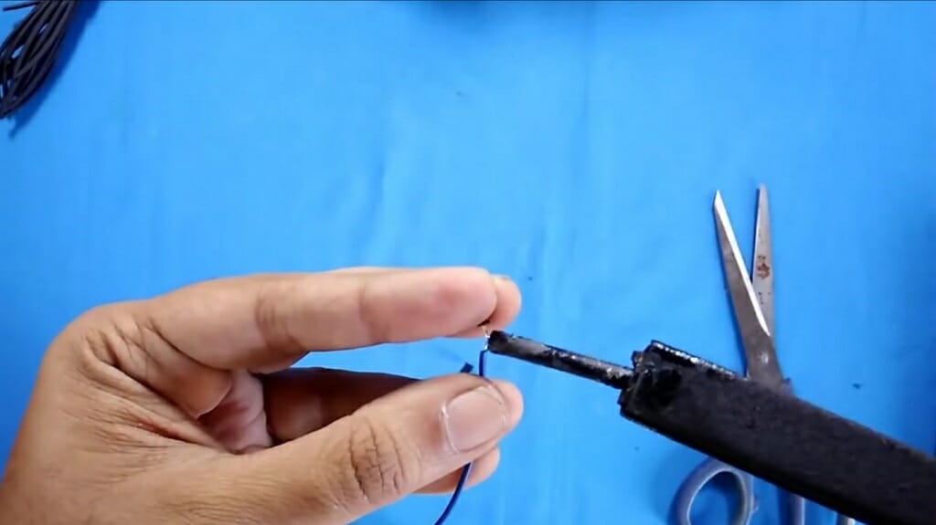 soldering the pins to the wire