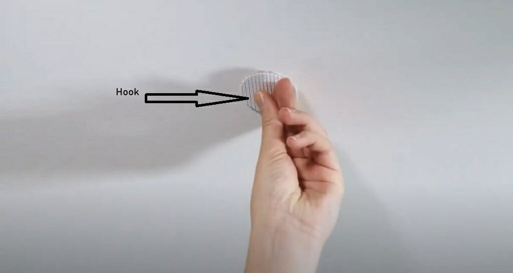 attaching a coin to the ceiling