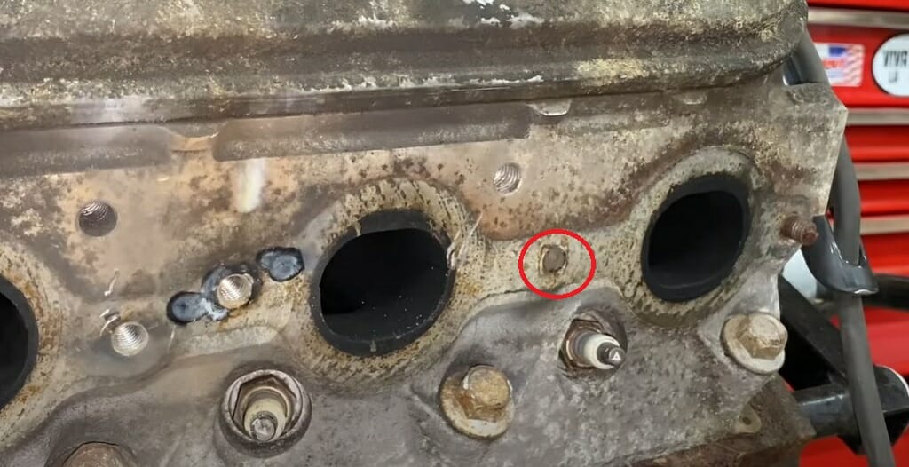 clean the surrounding engine block