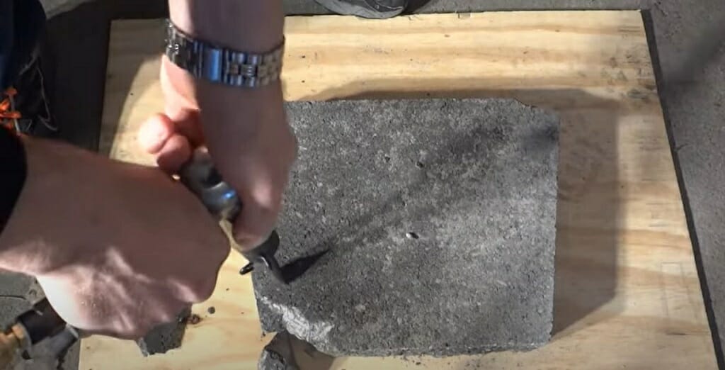 hand holding a safety glasses