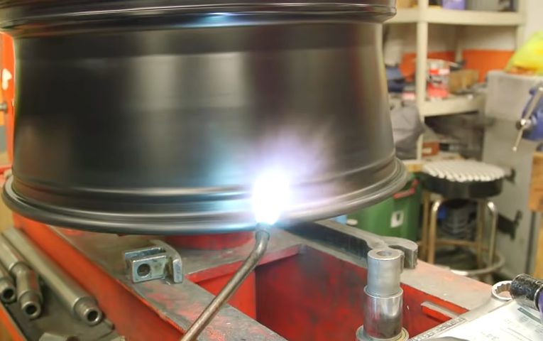 heat the bent section of the rim