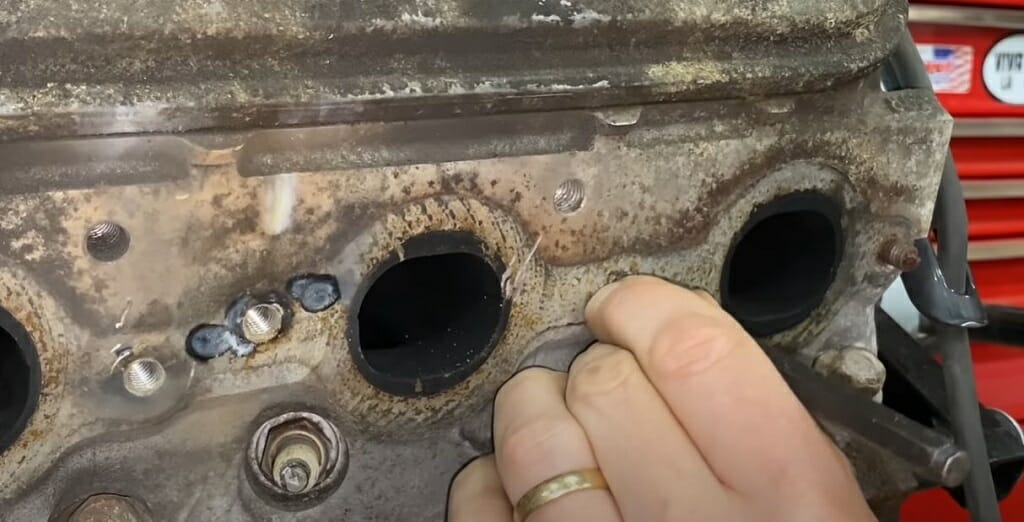 mark the center of the broken bolt