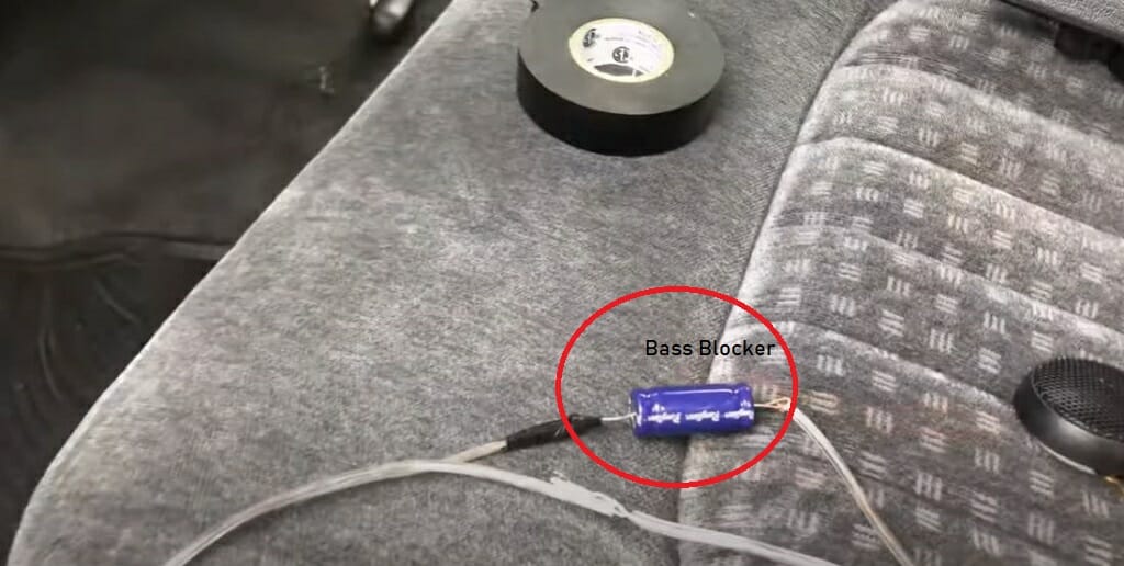 A bass blocker on car couch