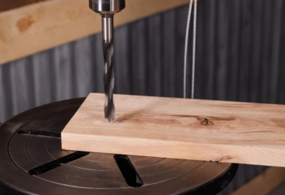 drilling a hole in wood using a brad point drill bit