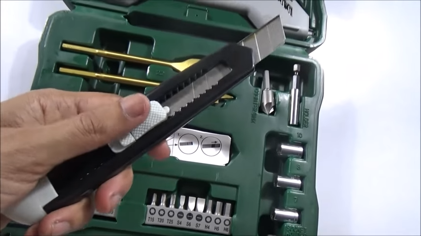 man holding a cutter