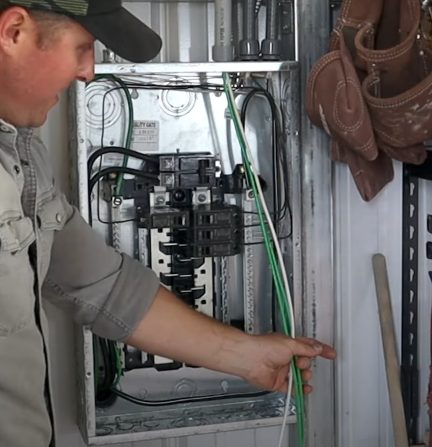 placing the wire in the dedicated hole on the box