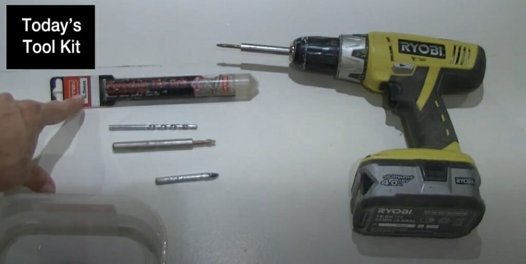 tool kit set for drilling laid on table