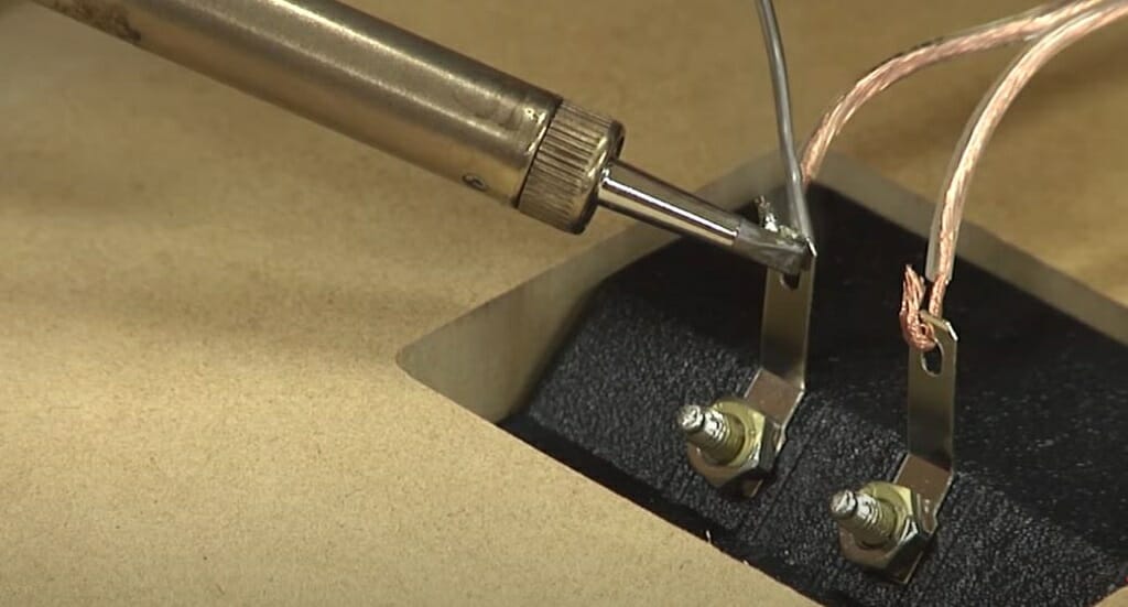 bringing the solder close to the connecting points