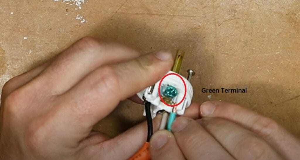green terminal of a screw terminal