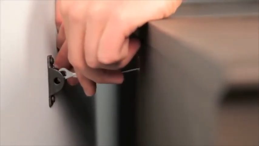installing anti-tip kits on the wall