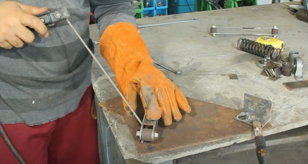 welding the steel plate to the support piece