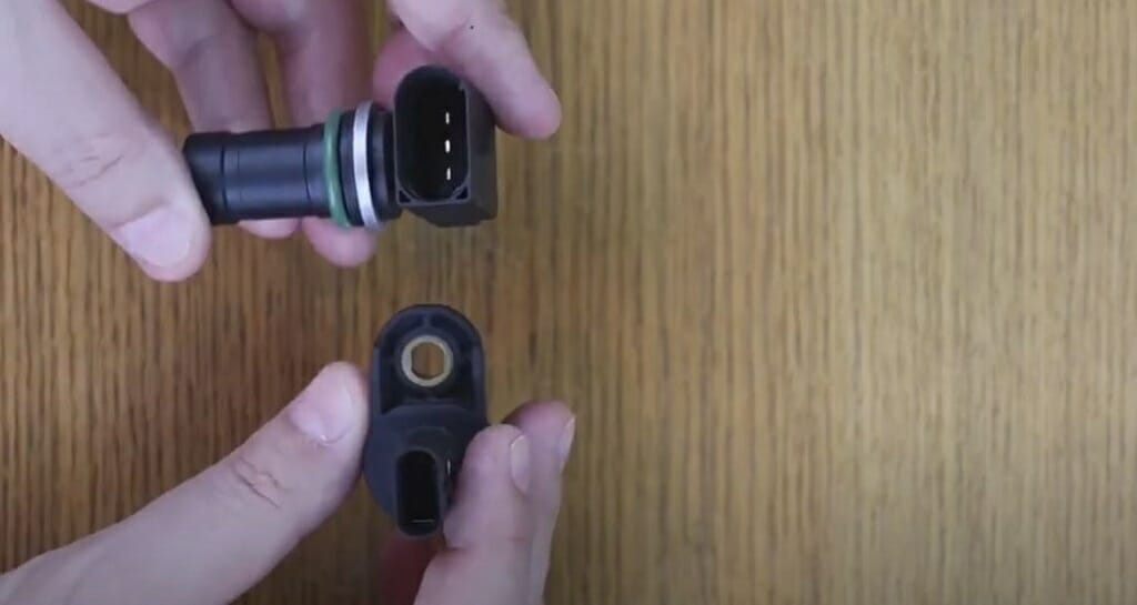 hands holding a 3-wire sensor