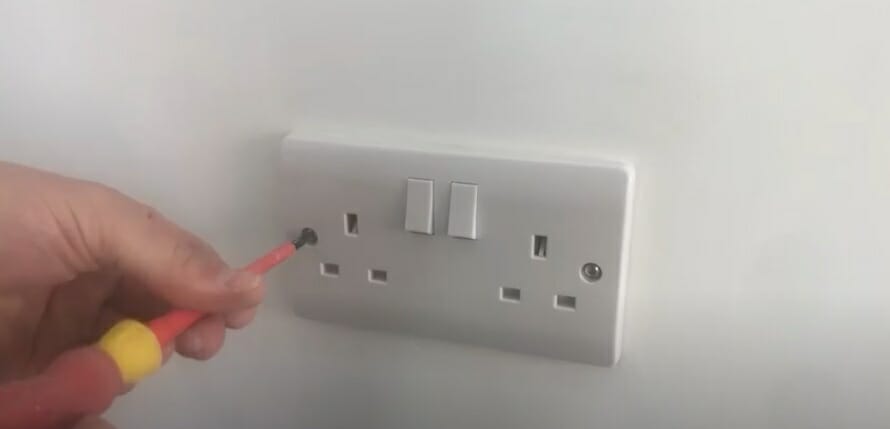 unscrewing electrical socket