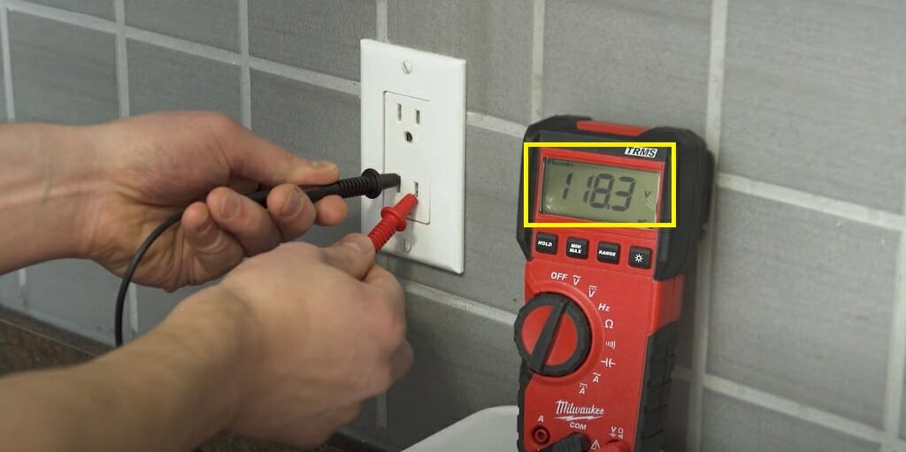 11.83 reading on the multimeter during an wall outlet testing
