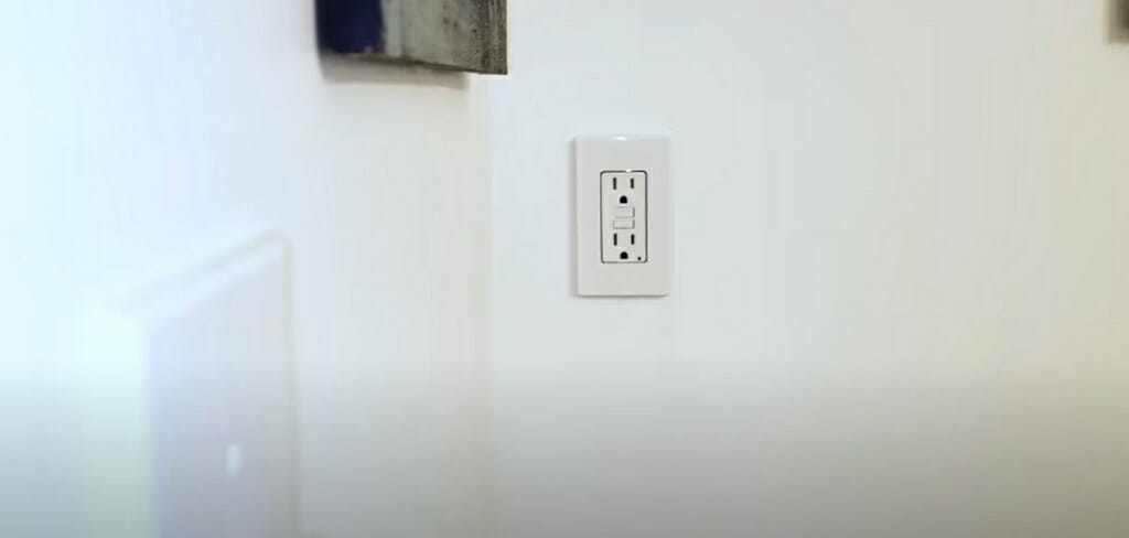 a gfci outet on a white wall
