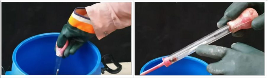 checking the gravity with a hydrometer