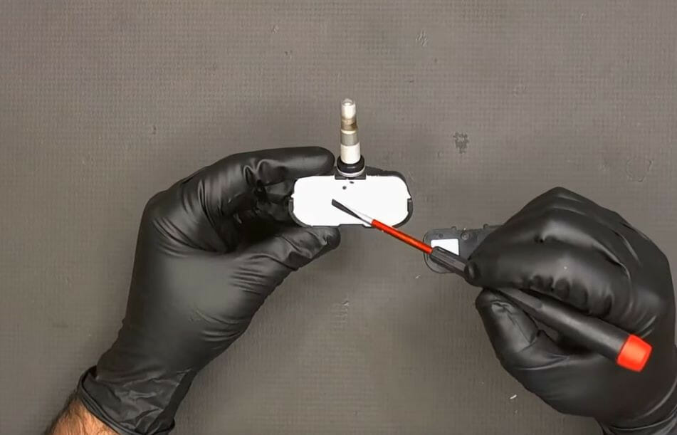 removing the TPMS sensor's back cover