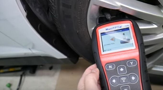 using diagnostic tools to test tire pressure