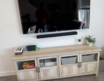 A wall-mounted TV with tv concealment management for wires
