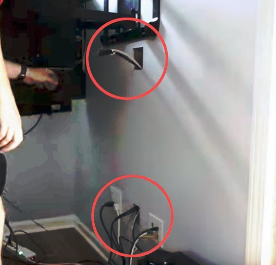 man showing section to hide wires on the wall