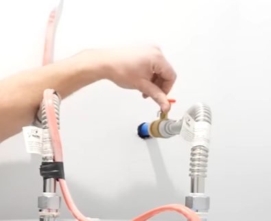 A person securing the heater water