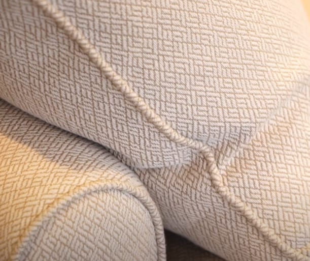 A close-up image of a microfiber cushion pillows