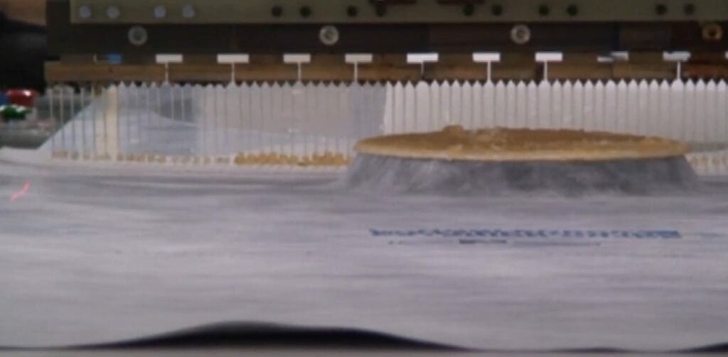 A hot melt adhesive application on fabric