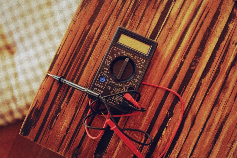 A multimeter on a wooden table