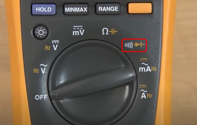A digital multimeter featuring a continuity symbol