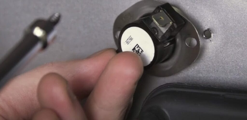A person disconnecting a power supply