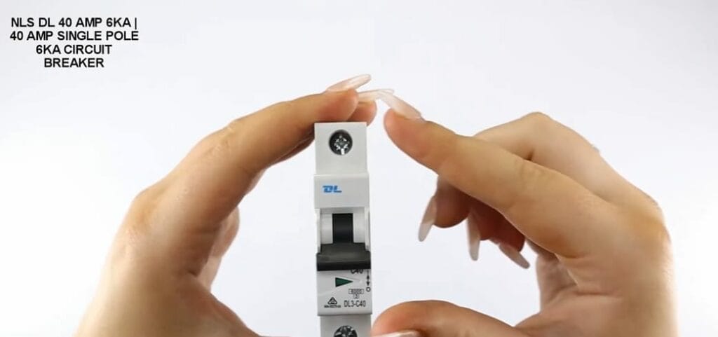 A person holding a circuit breaker