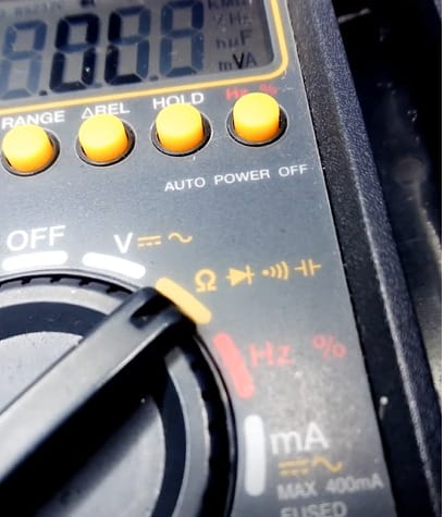 A close up of a digital multimeter
